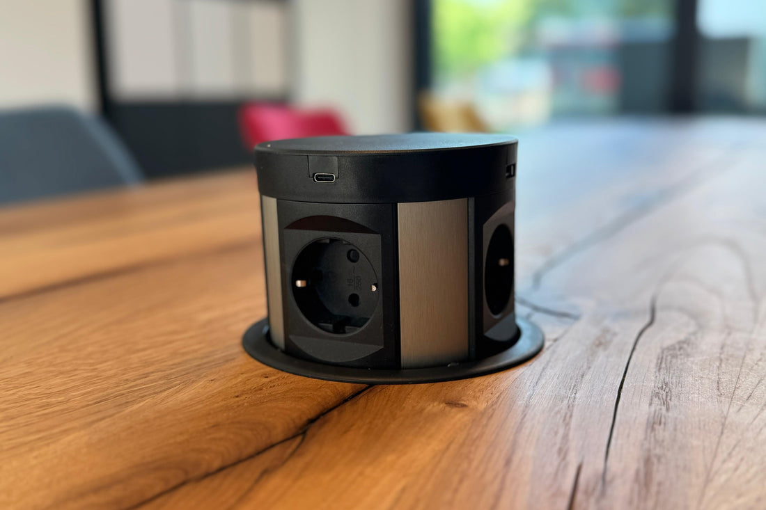 Solid oak conference table with media module by Holzwerk Hamburg, showcasing a sturdy wooden surface and integrated media storage.